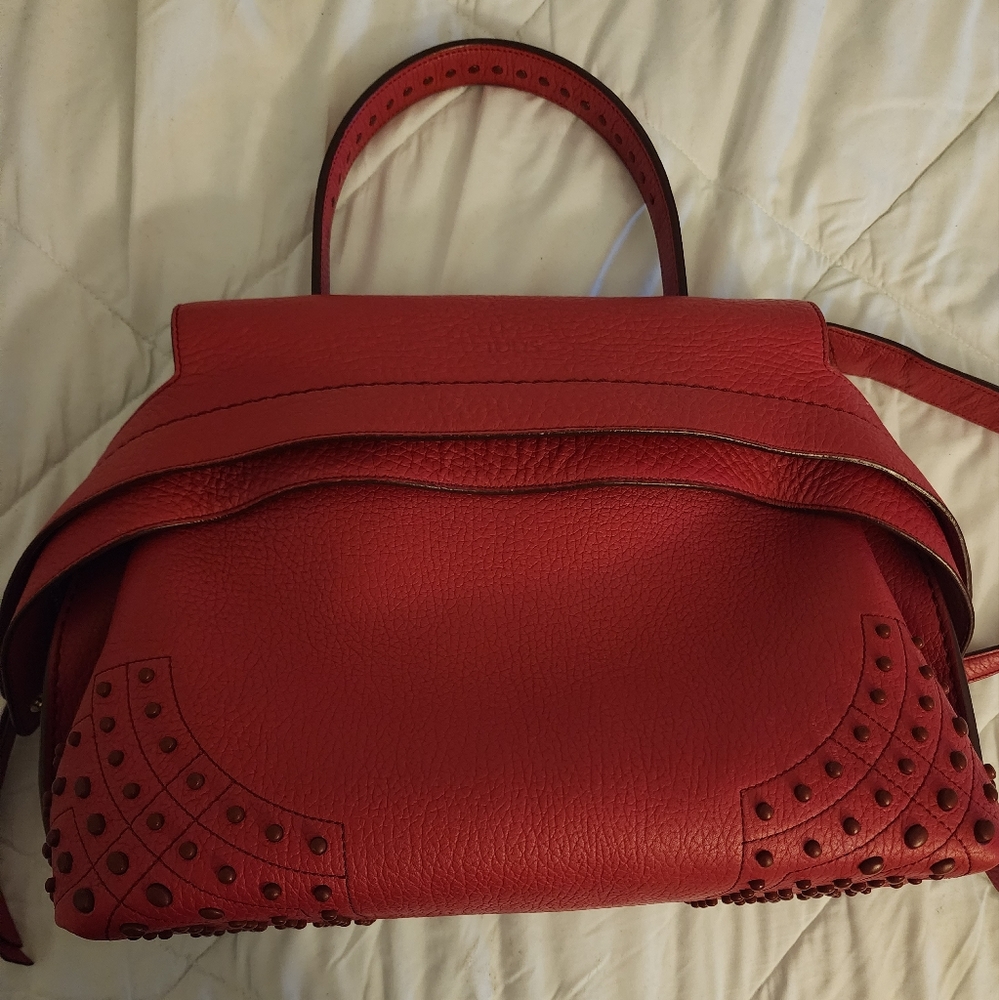 Authentic Tod's fuchsia Pink Wave leather handbag